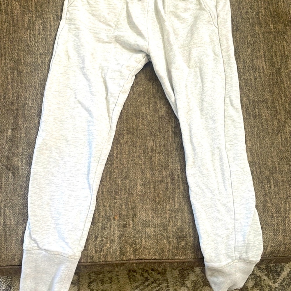 Gray sweats with blue and pink wave. Closing on bottom ankles and waist for girl
